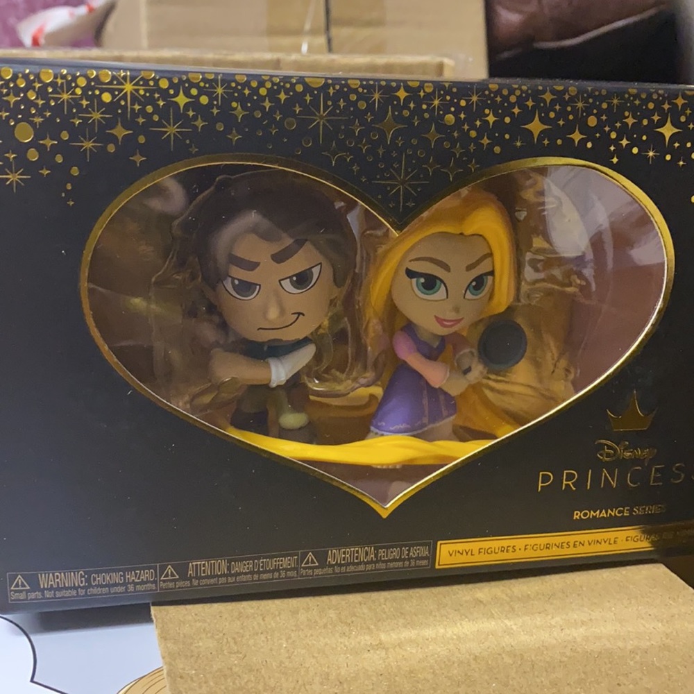 - Princess Flynn and rupunzel funko pop mint collector item Christmas in July